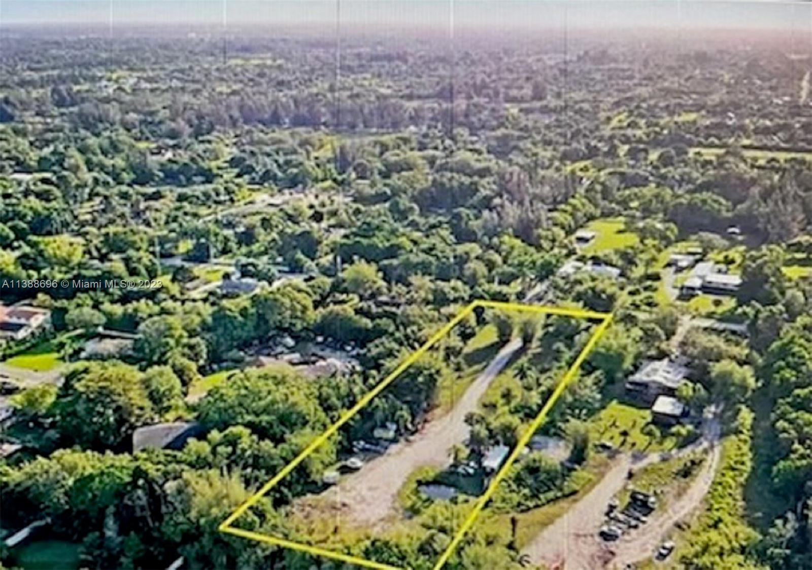 An aerial view shows a rectangular plot of land outlined in yellow amidst dense trees — 6453 SW 185th Way, Southwest Ranches FL 33332, SOUTHWEST RANCHES, FL