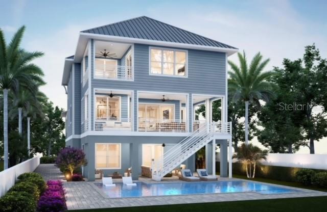 A digital rendering of a three-story blue coastal house with a pool and outdoor staircase — 10178 GULF BOULEVARD, TREASURE ISLAND, FL