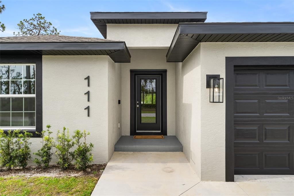 111 SUNSET ROAD, ROTONDA WEST, FL — photo 2 of 30