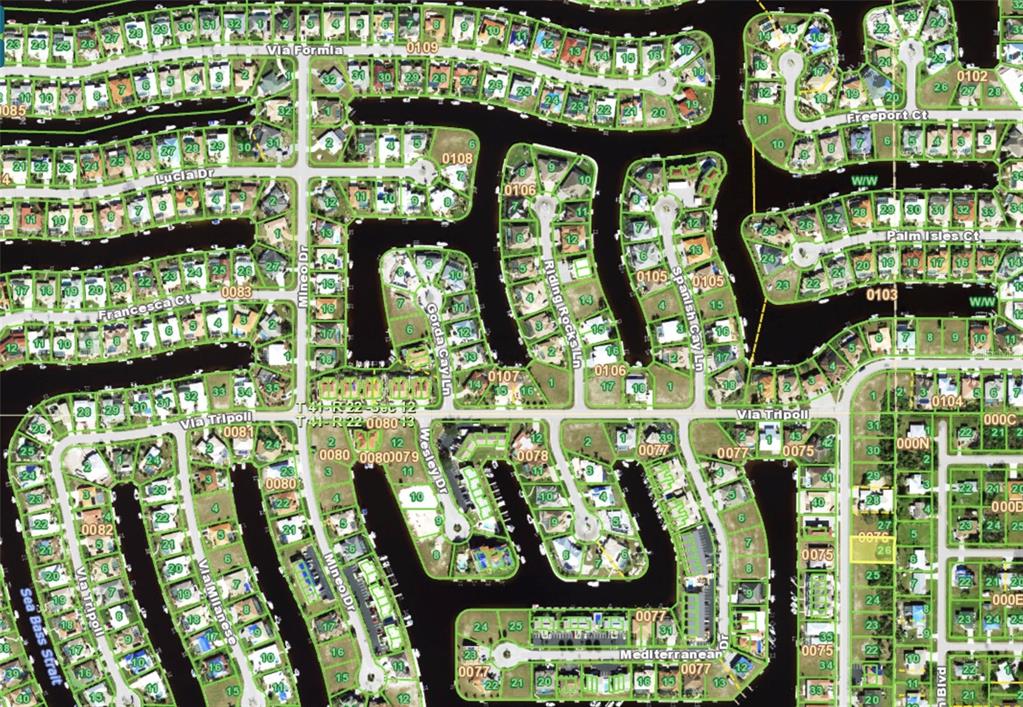This is an aerial map showing residential lots and waterways in a suburban neighborhood — 2517 MAGDALINA DRIVE, PUNTA GORDA, FL
