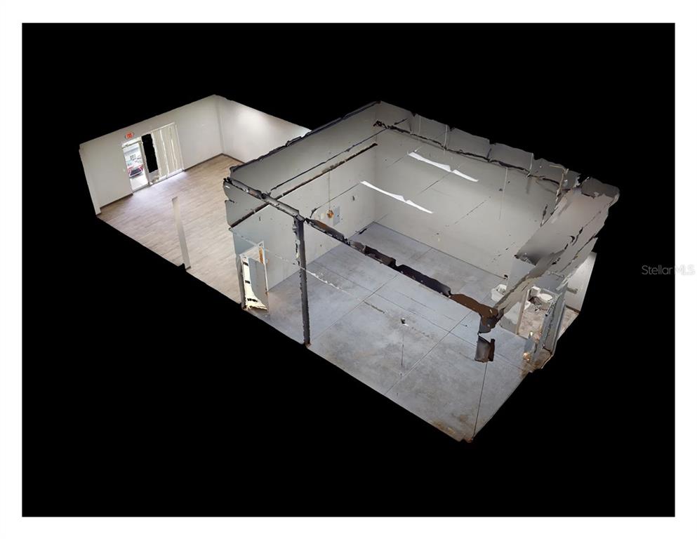 This is a 3D rendering of a commercial space with a front area and back room — 1400 TROPIC PARK DRIVE UNIT 1490, SANFORD, FL