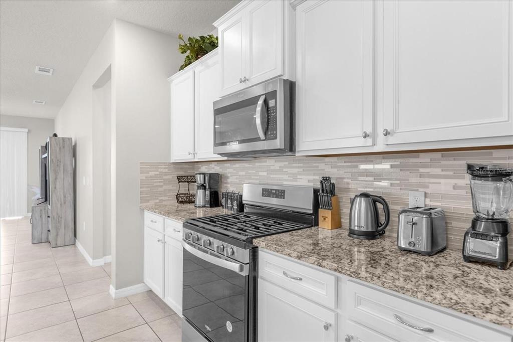 7211 OAKMOSS LOOP, DAVENPORT, FL — photo 5 of 22