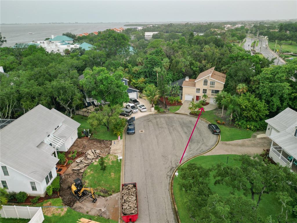 An aerial view shows a two-story house at the end of a residential cul-de-sac — 4003 BAYSIDE COURT, BRADENTON, FL
