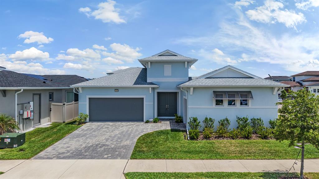A pair of white double doors with decorative frosted glass panels and brass hardware — 10470 PURPLE THISTLE WAY, SAN ANTONIO, FL
