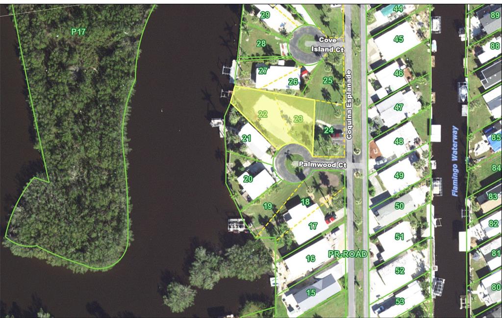This is an aerial map showing residential lots, streets, and a waterway — 6604 PALMWOOD COURT, PUNTA GORDA, FL