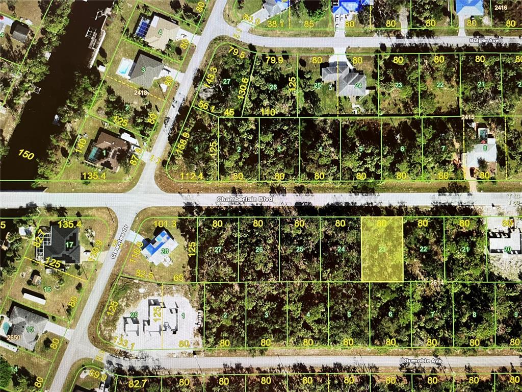 This is a satellite map showing residential lots and street layouts in a neighborhood — 14417 CHAMBERLAIN BOULEVARD, PORT CHARLOTTE, FL