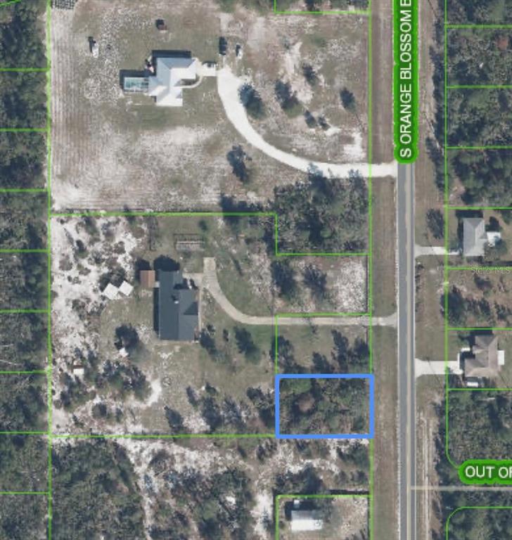 An aerial map view shows a rectangular lot highlighted in blue next to a road — 10657 S ORANGE BLOSSOM BOULEVARD, SEBRING, FL