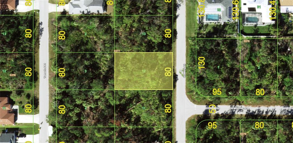 This is a satellite map view showing a highlighted vacant residential lot — 3027 SUDBURY STREET, PORT CHARLOTTE, FL