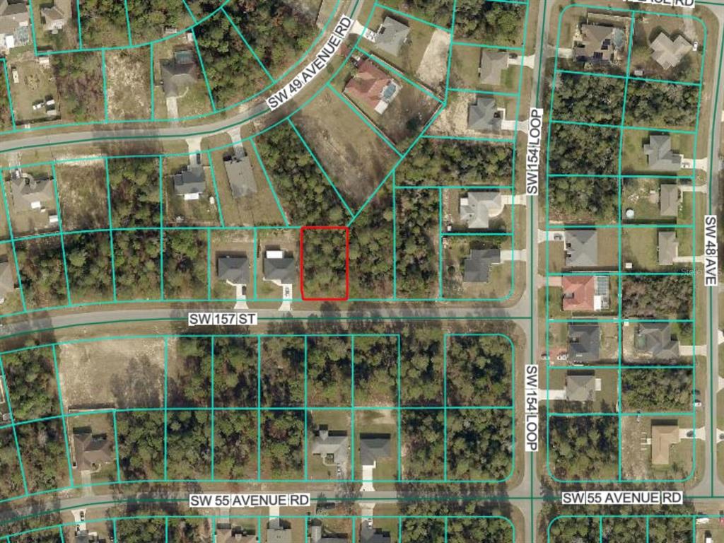 This aerial map shows a vacant, rectangular lot outlined in red along a residential street — 0 SW 157TH STREET, OCALA, FL