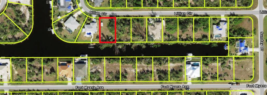 This is an aerial map showing a vacant residential lot highlighted in red along a canal — 14518 LILLIAN CIRCLE, PORT CHARLOTTE, FL