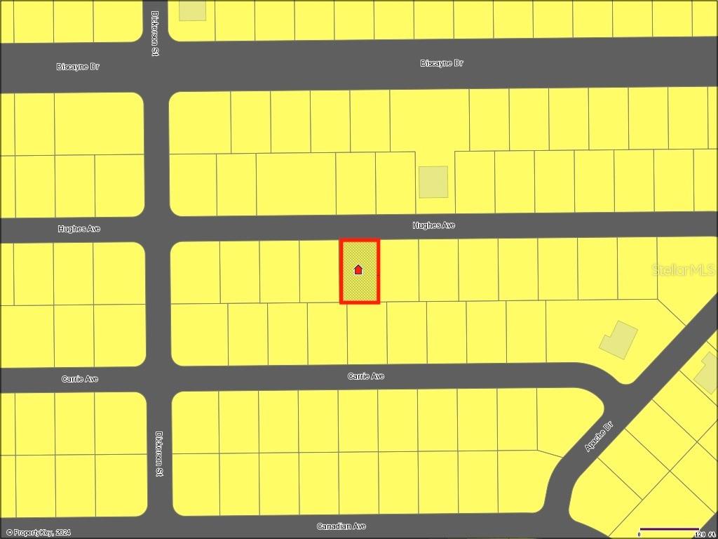This is a map showing a highlighted residential property lot located between Hughes Avenue and Carrie Avenue — 14119 HUGHES AVENUE, PORT CHARLOTTE, FL