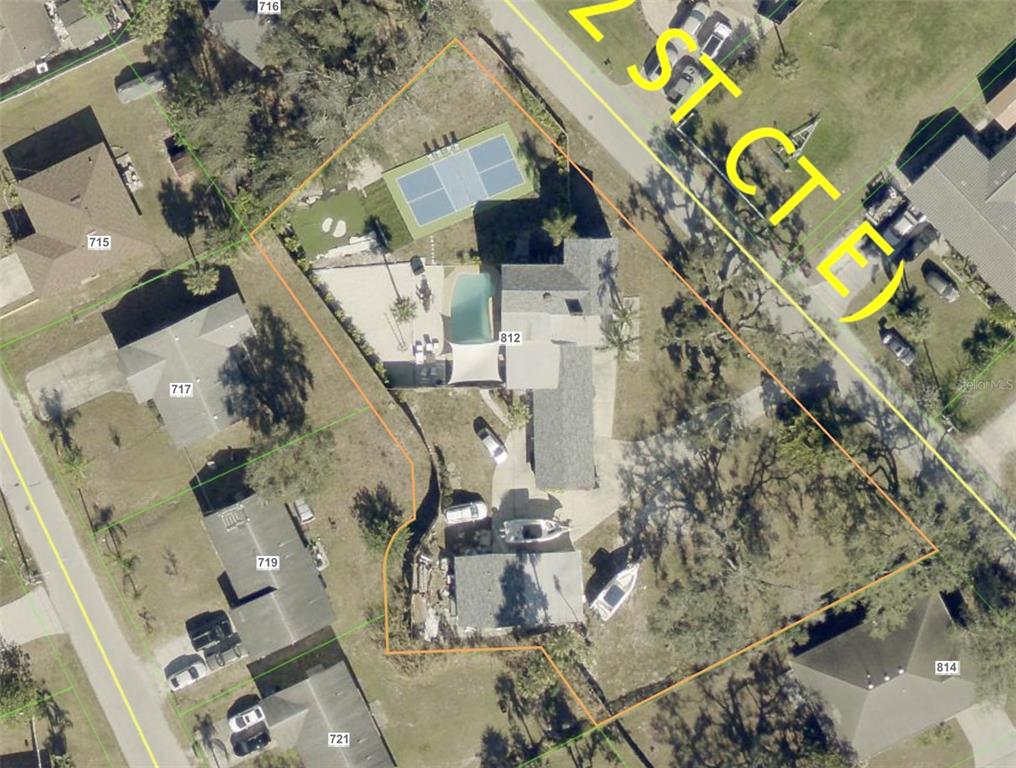This is an aerial map view of a residential property featuring a pool and court — 812 TROPICAL DRIVE, BRADENTON, FL