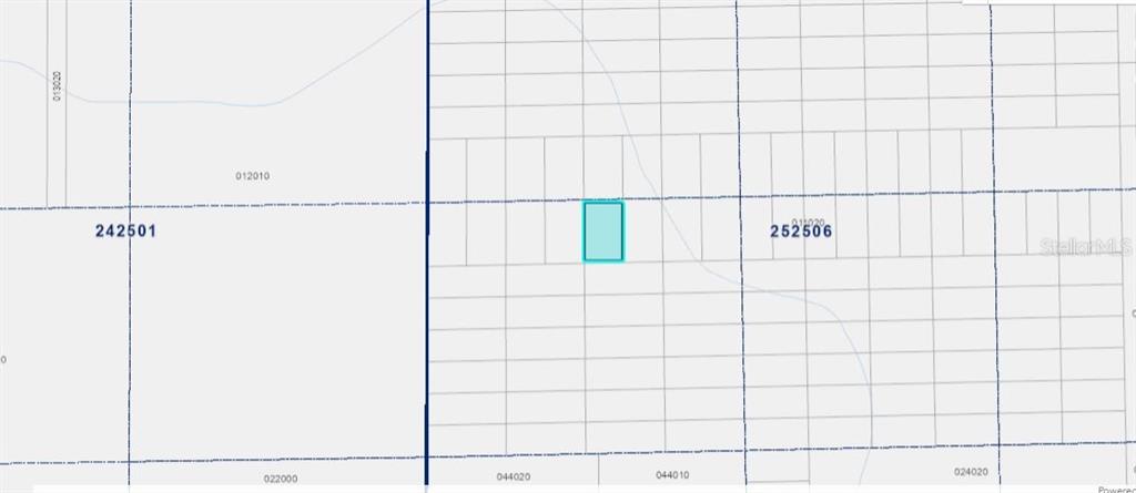 This is a map showing a highlighted rectangular property parcel within a grid of lots — JUDY RD, POLK CITY, FL