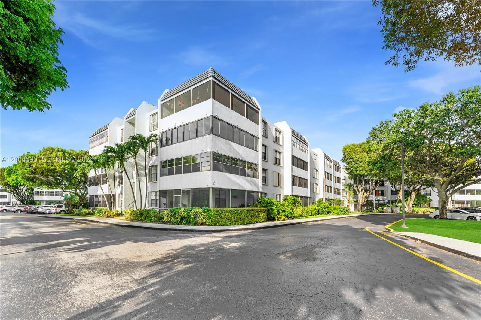 This is a digital rendering of a living and dining area with green furniture — 10852 N Kendall Dr # 312, Miami FL 33176, MIAMI, FL
