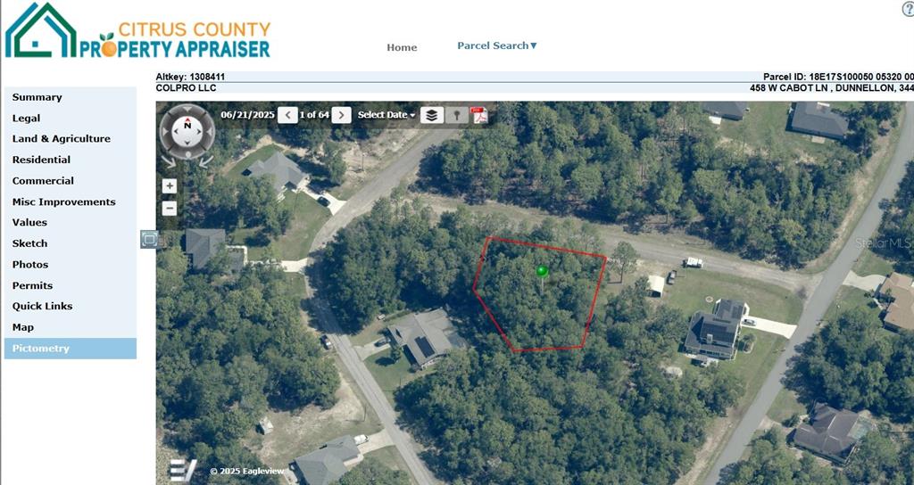 This is an aerial map view of a wooded residential lot outlined in red — 458 W CABOT LANE, DUNNELLON, FL