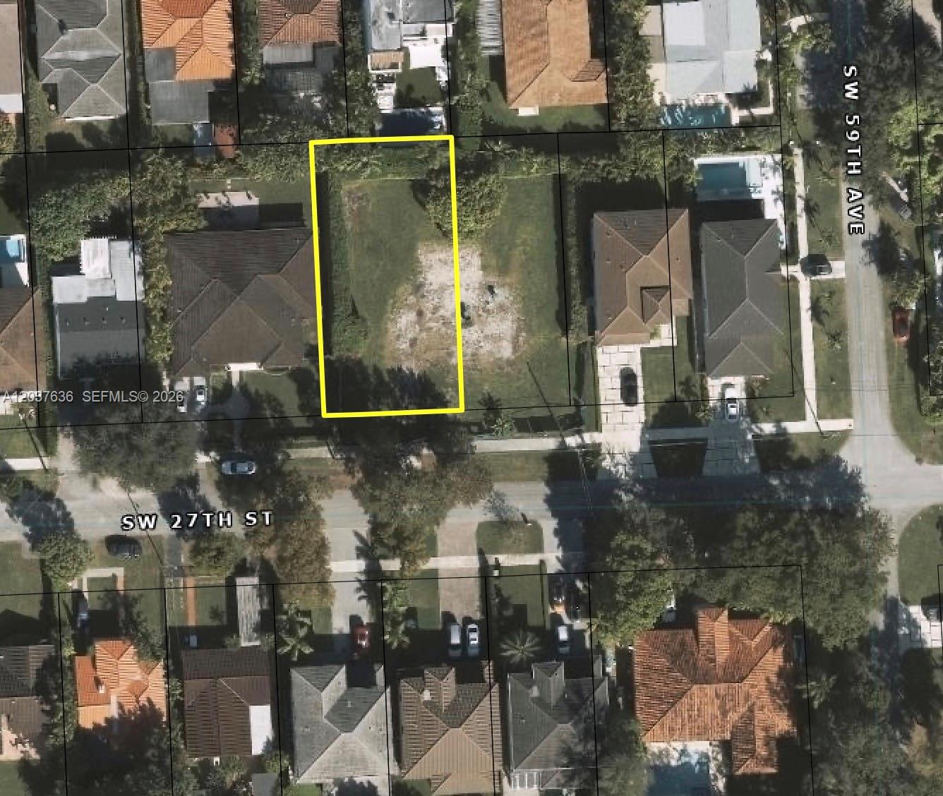 This aerial map shows a vacant residential lot outlined in yellow on a suburban street — 5921 SW 27 st, Miami FL 33155, MIAMI, FL