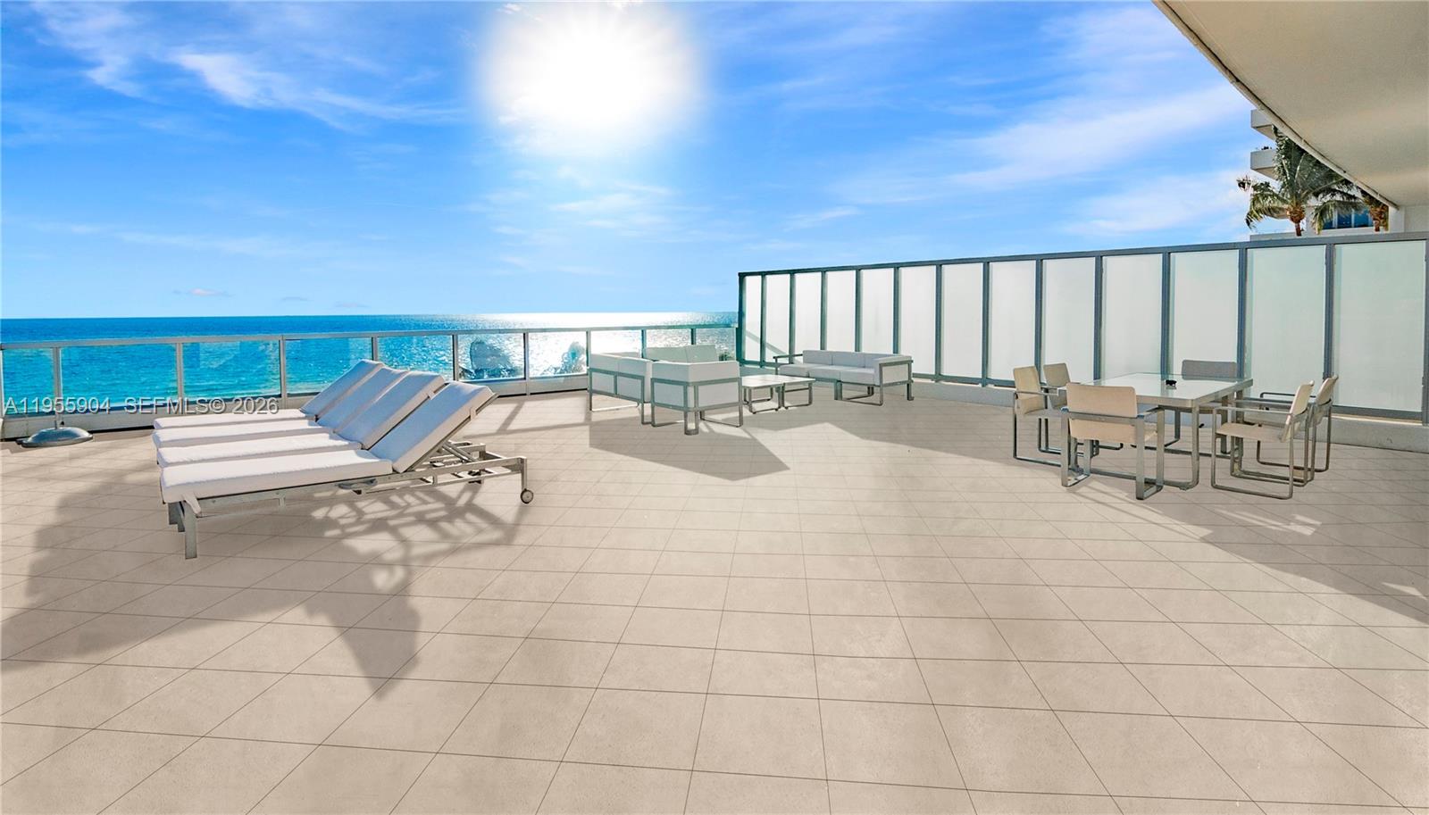 A spacious outdoor balcony features lounge chairs, patio furniture, and a panoramic ocean view — 4391 Collins Ave, Miami Beach FL 33140, MIAMI BEACH, FL