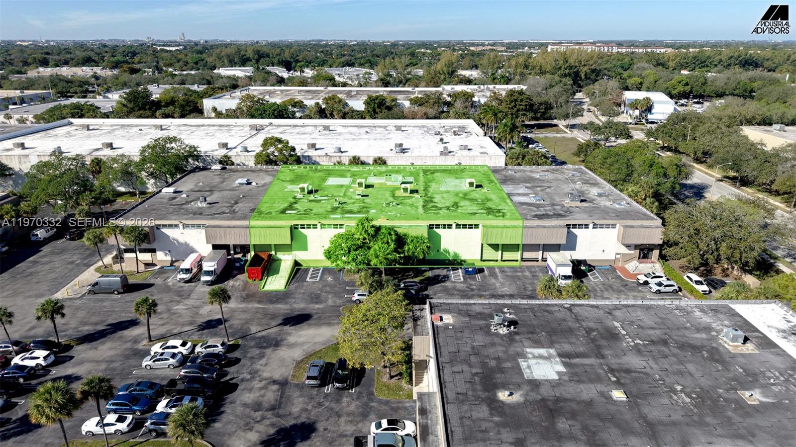 An aerial view shows a commercial warehouse building with a highlighted green roof section — 5800 E Miami Lakes Dr E, Miami Lakes FL 33014, MIAMI LAKES, FL