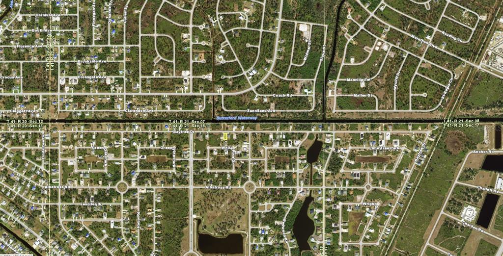 This is an aerial map showing a residential neighborhood with a highlighted property lot — 201 BAYTREE DRIVE, ROTONDA WEST, FL