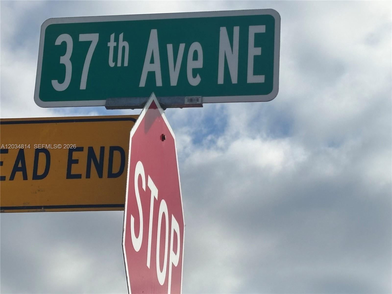 A street sign for 37th Ave NE is positioned above a stop sign and dead-end sign — XXX.37 TH AVE NE, Naples FL 34120, NAPLES, FL