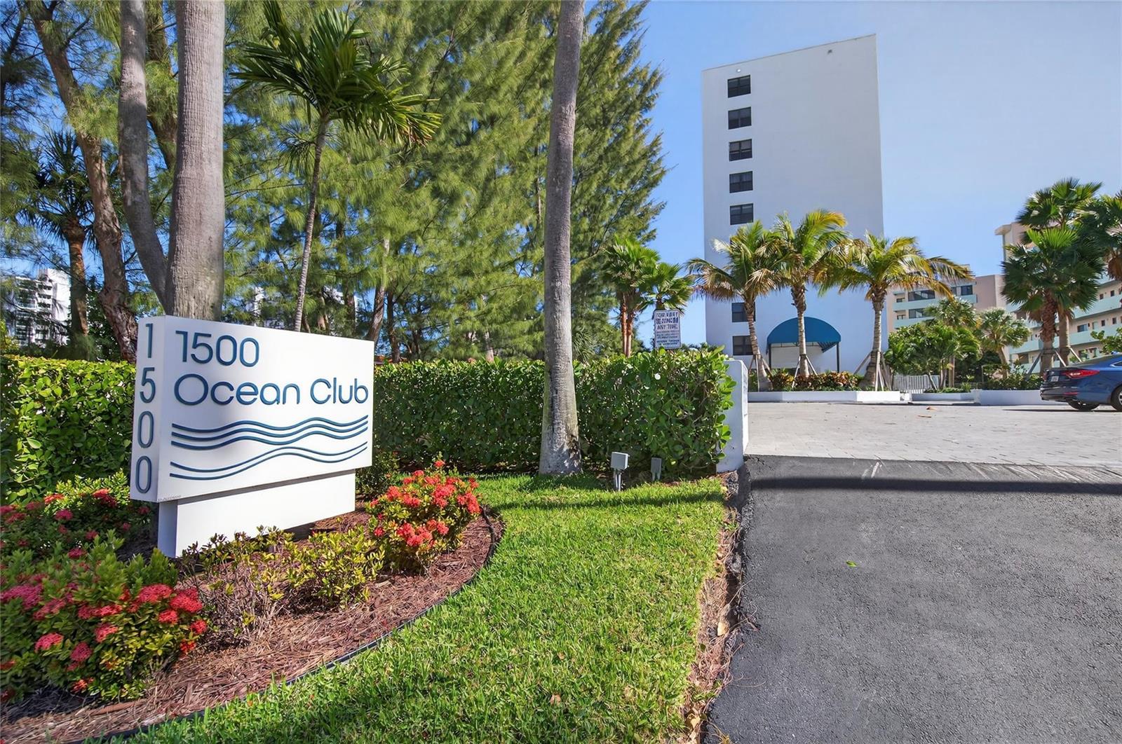 A sign for the 1500 Ocean Club stands in front of a tall white building — 1500 N Ocean Boulevard # 203, Pompano Beach FL 33062, POMPANO BEACH, FL