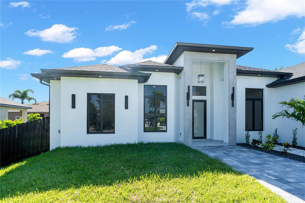 129 SW 34TH AVENUE, CAPE CORAL, FL — photo 2 of 30