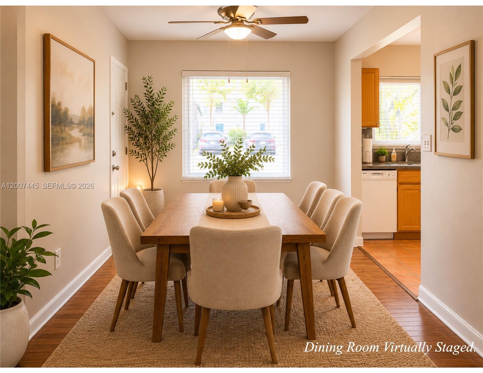 A dining room with a wooden table, six upholstered chairs, and a ceiling fan — 7734 SW 55th Ave # B, Miami FL 33143, MIAMI, FL