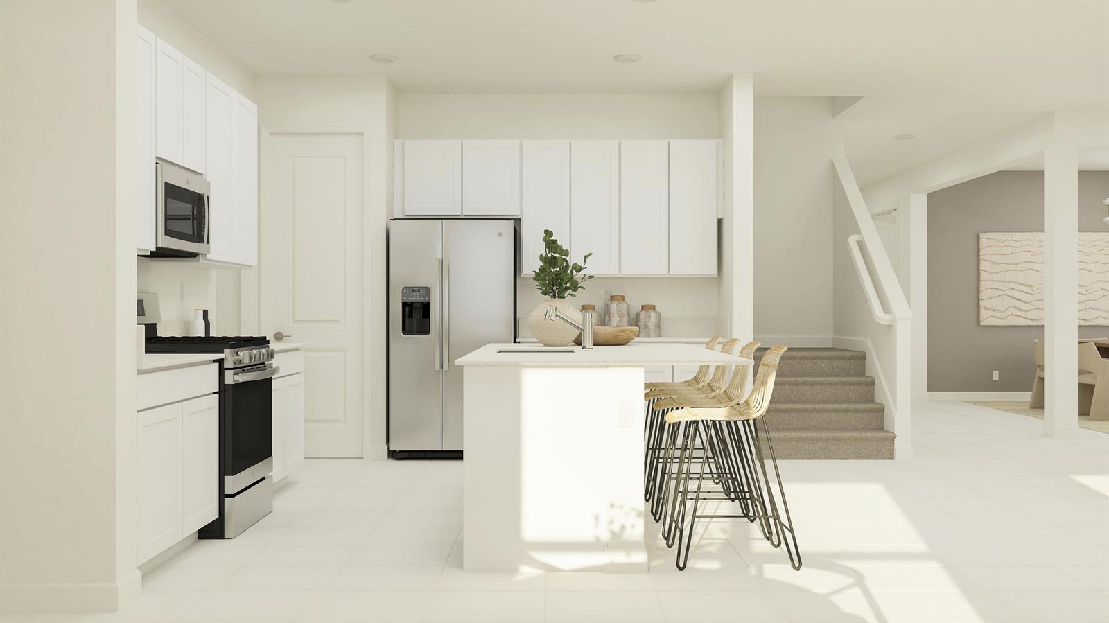This is a rendering of a modern kitchen featuring white cabinetry, stainless appliances, and an island — 19081 Wood Stork Way, FL 33470, FL
