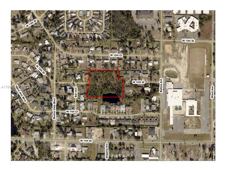 This is an aerial map showing a vacant lot outlined in red — W 12th St, Panama City FL 320401, PANAMA CITY, FL