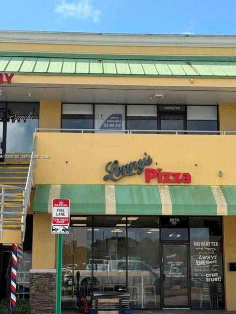 The exterior of a commercial building features a Lenny's Pizza storefront with a fire lane sign — 9070 Kimberly Blvd # 59, Boca Raton FL 33434, BOCA RATON, FL
