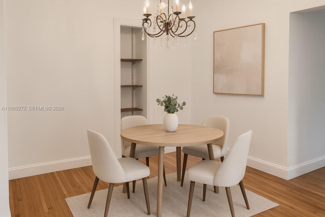 This is a digital rendering of a dining room featuring a round table and chairs — 505 74th St # 6B, Miami Beach FL 33141, MIAMI BEACH, FL