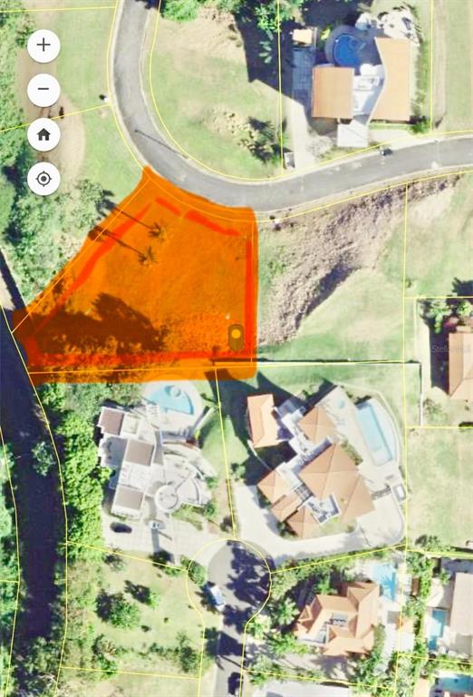 This aerial map shows a highlighted vacant residential lot situated along a curved street — URB. LAS VISTAS RIO MAR SOLAR 10, RIO GRANDE, PR