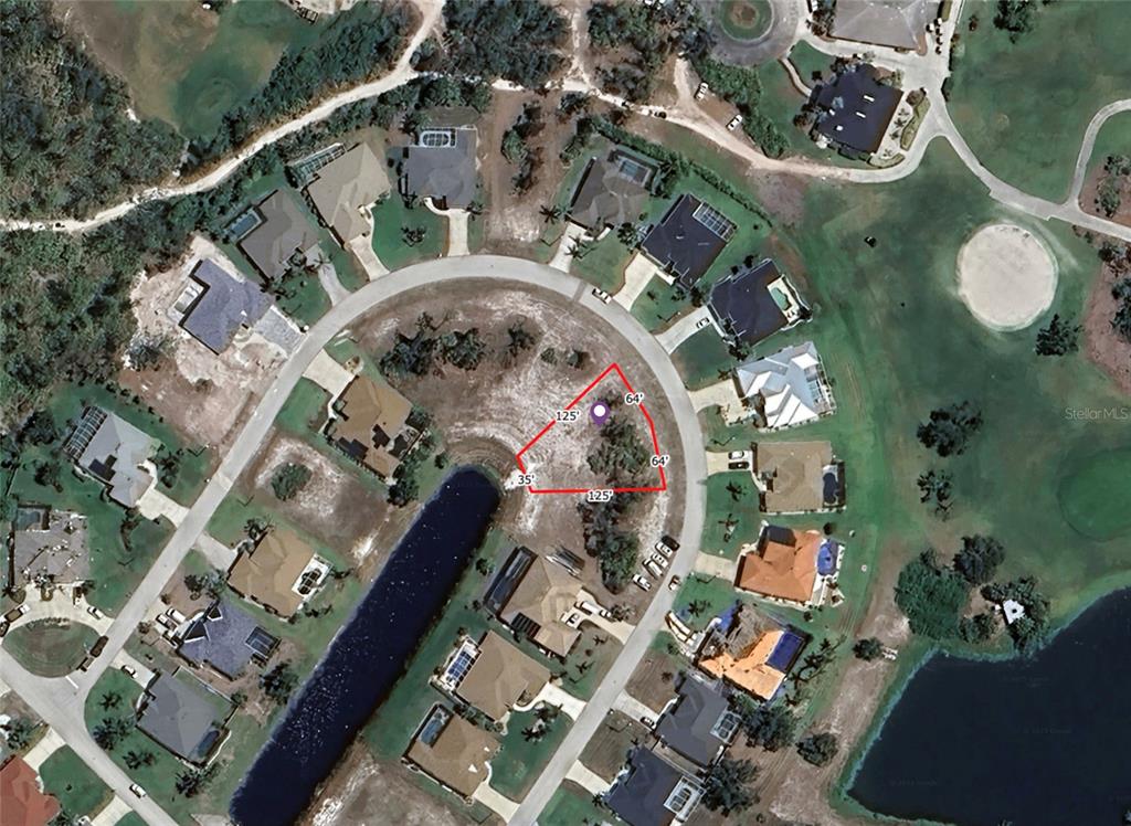 This is an aerial map showing a vacant residential lot outlined in red — 13 MEDALIST WAY, ROTONDA WEST, FL