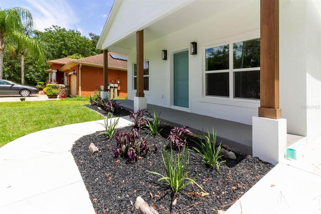 An empty room with light-colored walls, wood-look tile flooring, and a ceiling fan — TBD Lot 18 APAWAMIS DRIVE, SORRENTO, FL