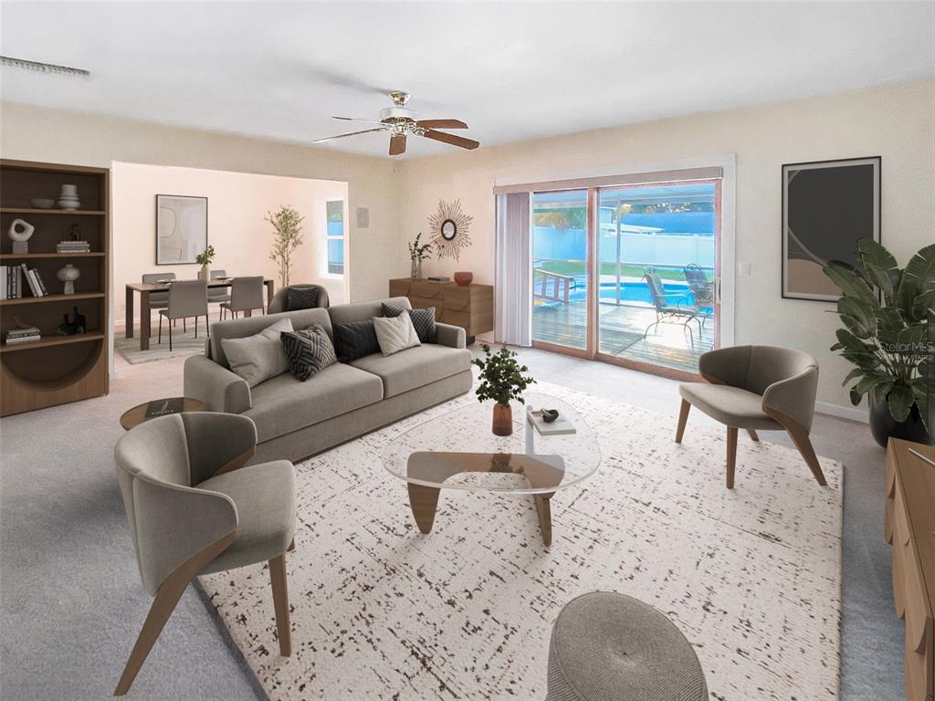 A living room with a sofa, two chairs, a glass coffee table, and sliding glass doors — 626 ORCHID LANE, ALTAMONTE SPRINGS, FL