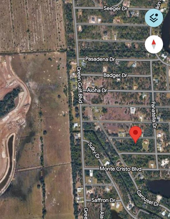 This is a satellite map view showing a residential area with a red location pin — 27113 SAVOY DRIVE, PUNTA GORDA, FL
