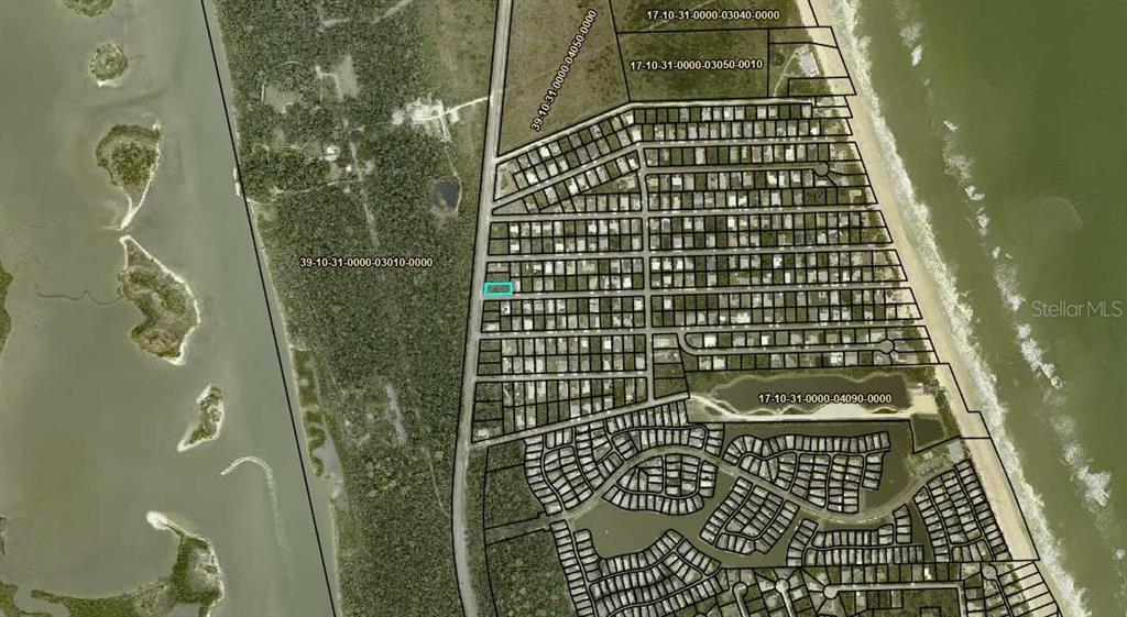 This is an aerial map showing a residential subdivision with a highlighted property lot — 6235 N OCEAN SHORE BOULEVARD, PALM COAST, FL