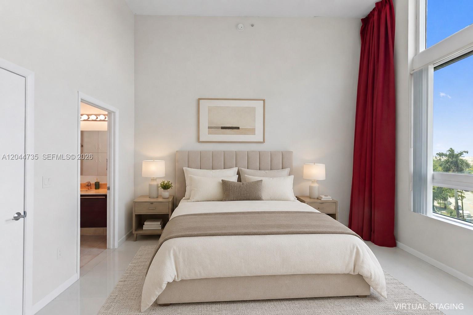 A bedroom with a bed, nightstands, and a large window featuring red curtains — 1900 N Bayshore Drive Dr # 715, Miami FL 33132, MIAMI, FL