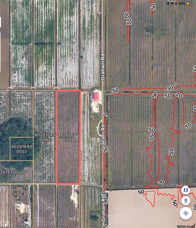 This is an aerial map showing a rectangular parcel of land highlighted in red — GRAHAM RD, PUNTA GORDA, FL