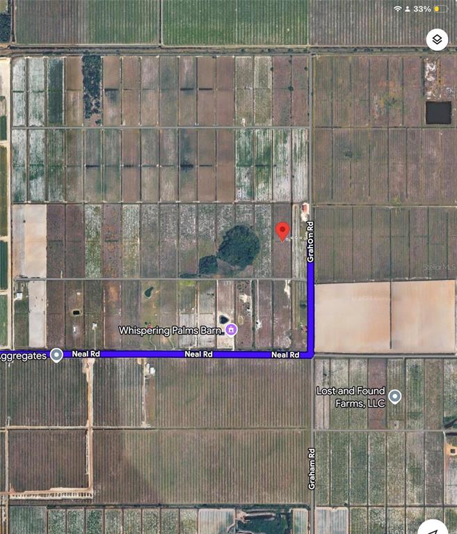 This is an aerial map showing a property location at the intersection of two roads — GRAHAM RD, PUNTA GORDA, FL