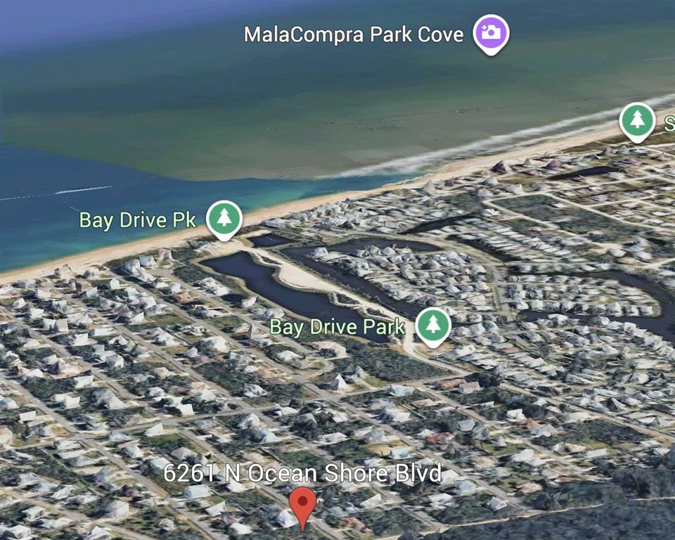 This is an aerial map view showing a coastal residential neighborhood with parks and water — 6261 N OCEAN SHORE BOULEVARD, PALM COAST, FL