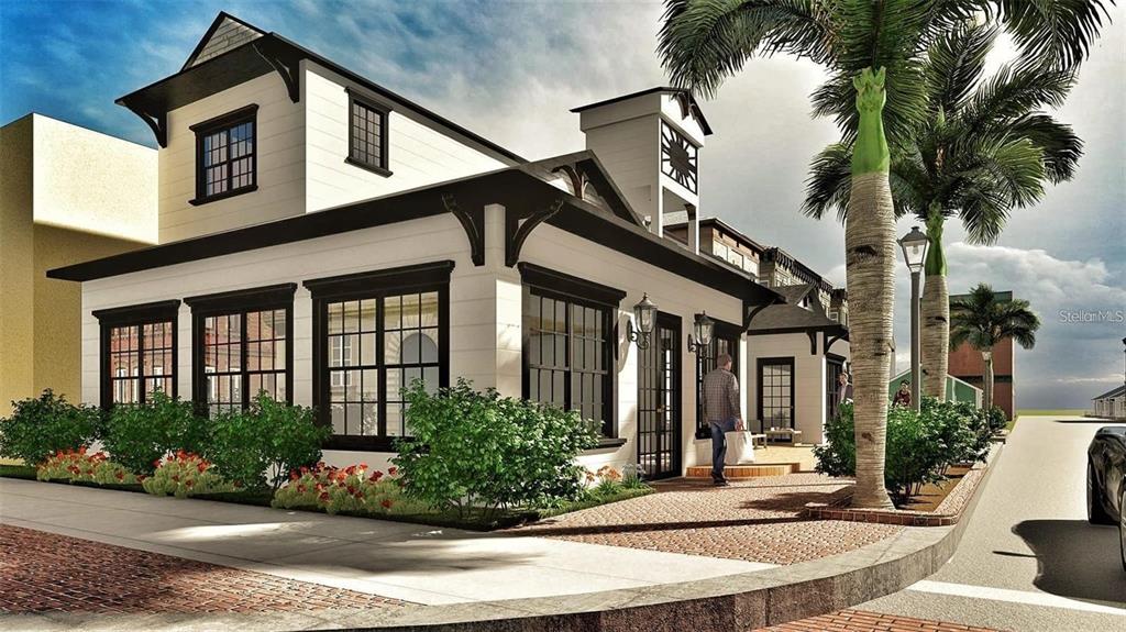 A white building with black trim and a brick walkway sits along a street — 216 TAYLOR STREET, PUNTA GORDA, FL