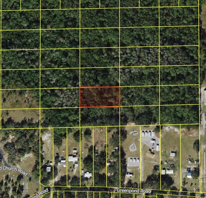 This is an aerial map showing a rectangular plot of land highlighted in red — POLK CITY, POLK CITY, FL