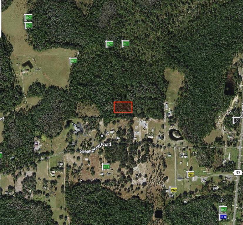 An aerial map shows a rectangular plot of land highlighted in red near Greenpond Road — POLK CITY, POLK CITY, FL