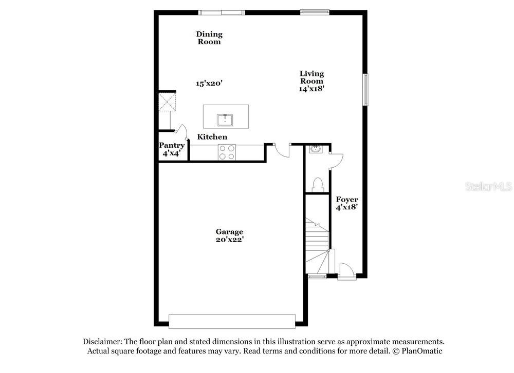 This is a floor plan of a home's first level featuring a garage and kitchen — 17932 BLISSFUL STARS DRIVE, LUTZ, FL
