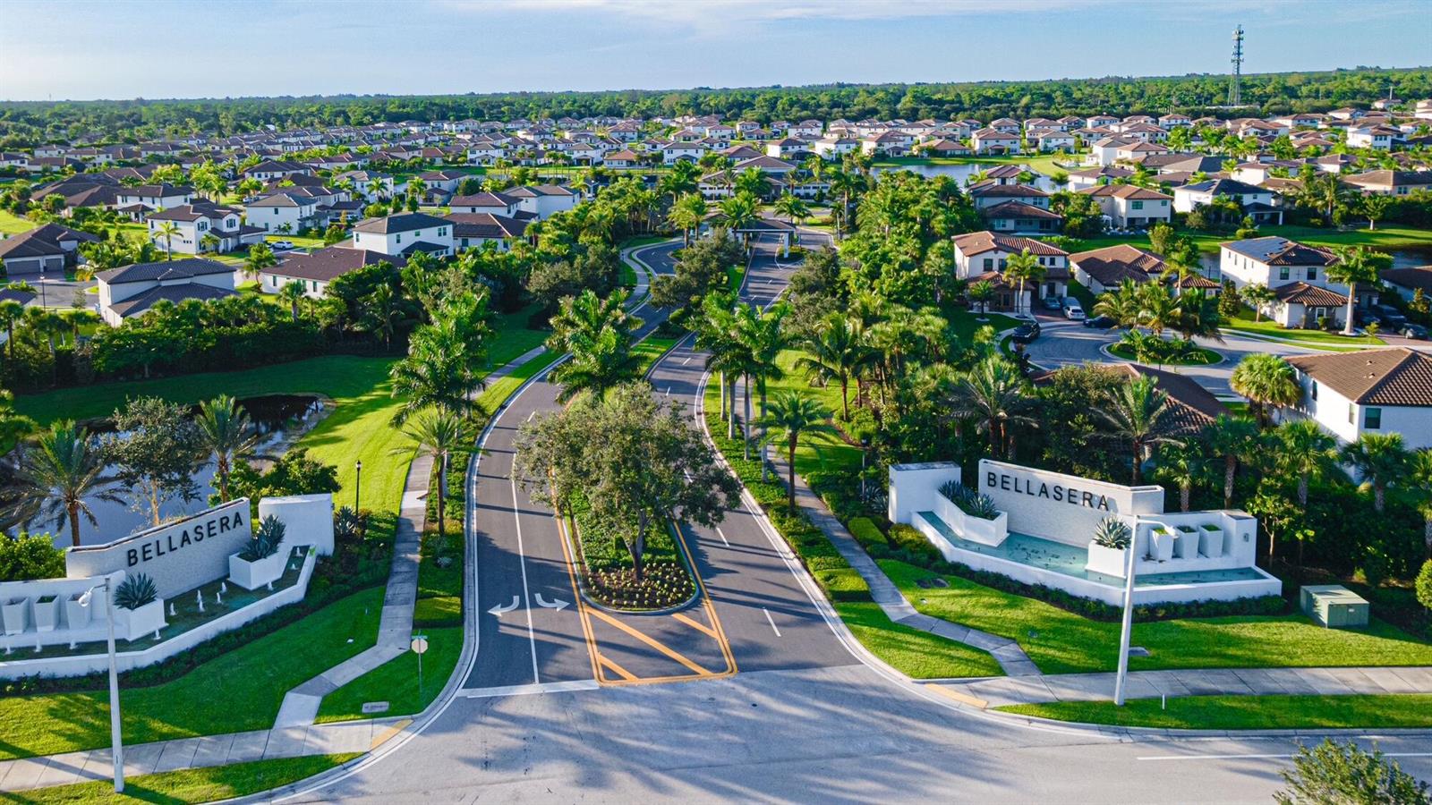 An aerial view shows the entrance to the Bellasera residential community with landscaped roads — 3509 Bauer Road, Royal Palm Beach FL 33411, ROYAL PALM BEACH, FL