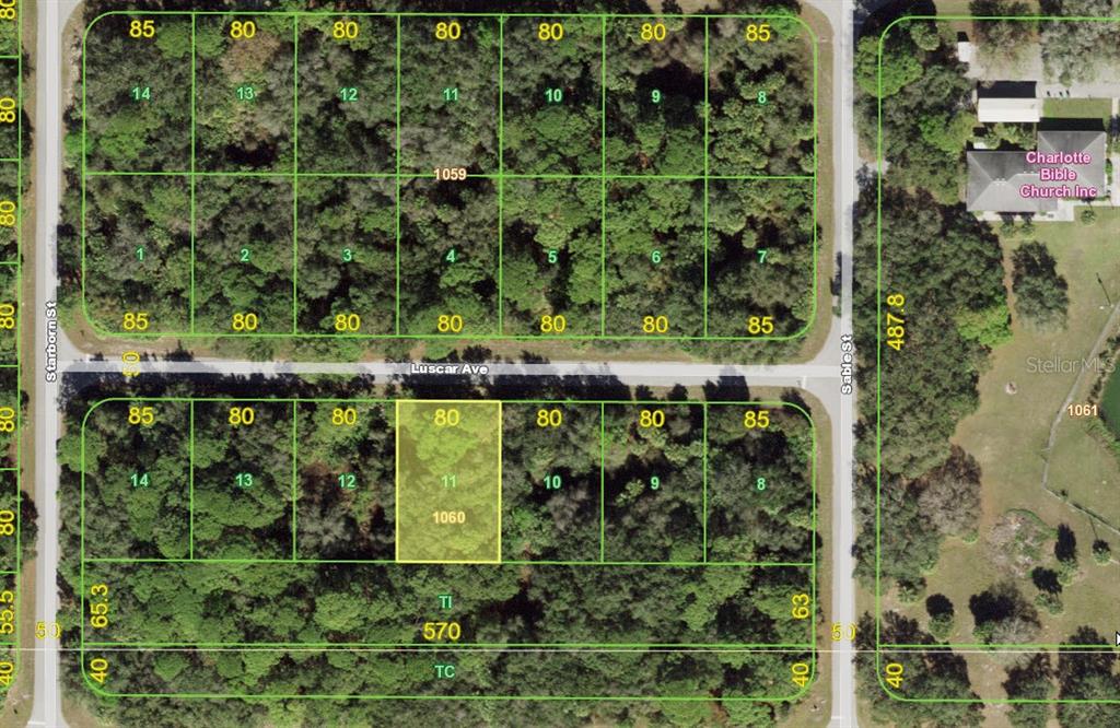 This is a map showing a grid of undeveloped residential land lots — 18113 LUSCAR AVENUE, PORT CHARLOTTE, FL