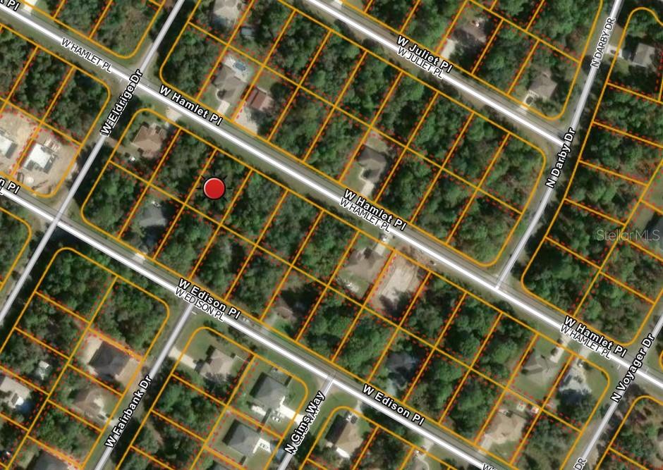 This is an aerial map showing a vacant residential lot marked with a red circle — 3054 W HAMLET PLACE, CITRUS SPRINGS, FL