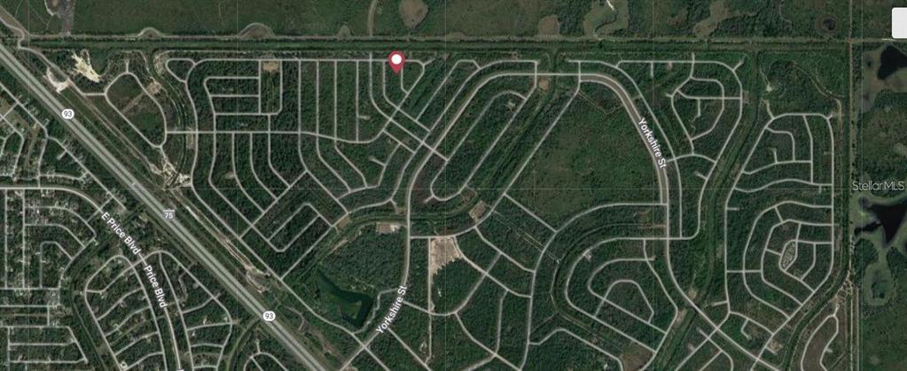 This is an aerial map view of a residential neighborhood with a red location pin — BATOKO STREET, NORTH PORT, FL