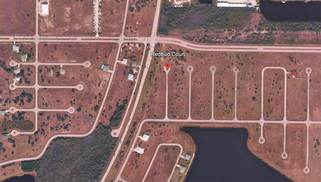 This aerial map shows a residential development with vacant lots and a cul-de-sac — 13 REDBUD COURT, PLACIDA, FL